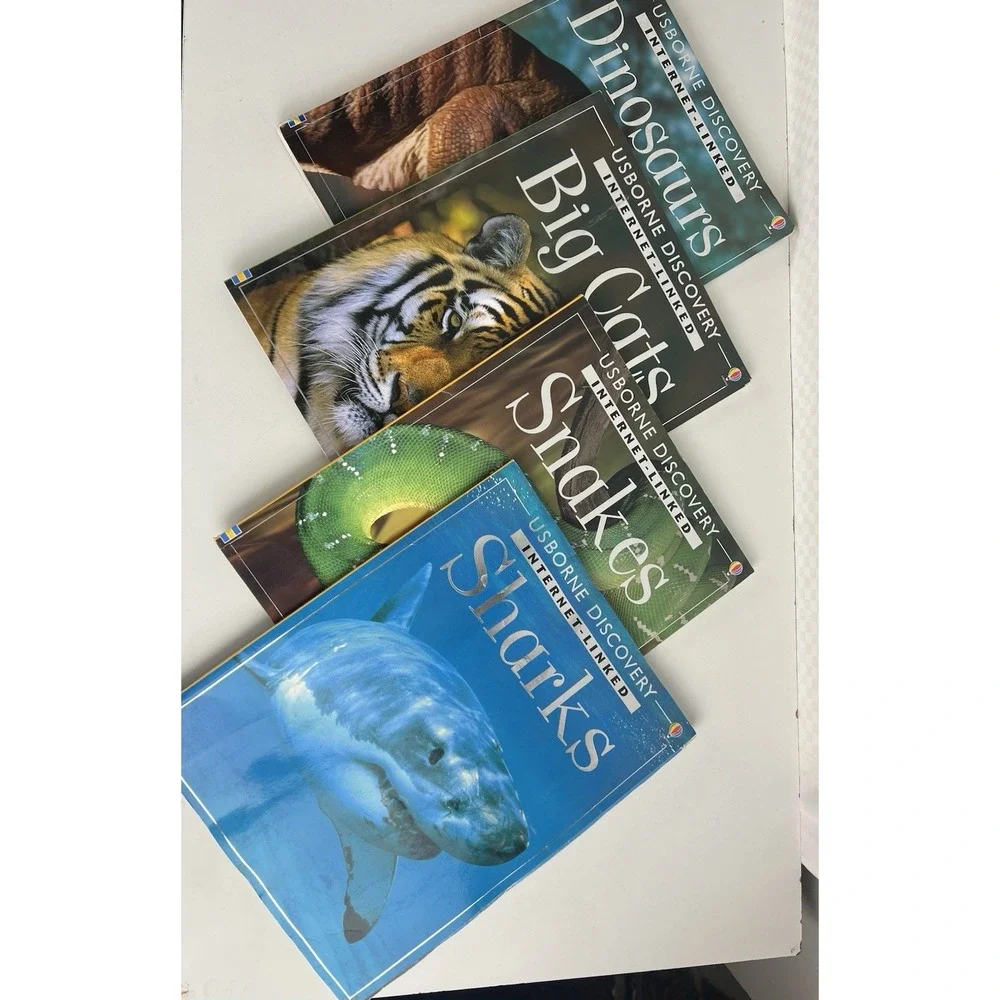 Entire set of Discover Books. Big Cats, Shark, Snakes, & Dinosaurs 4 In Total